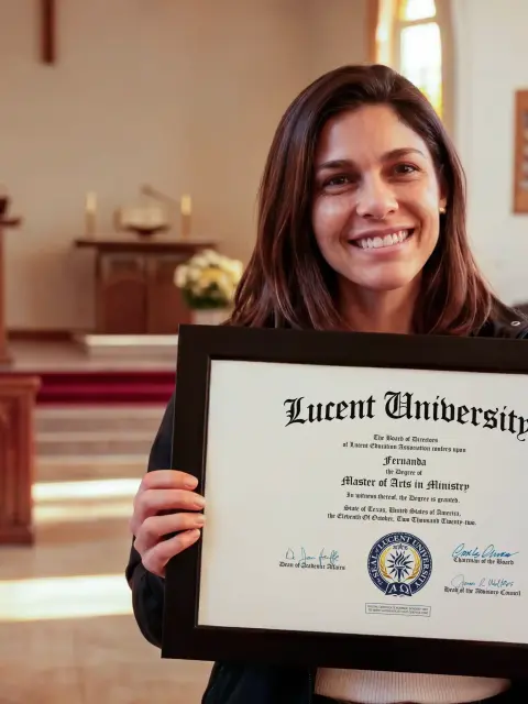 Lucent University student holding an official certificate