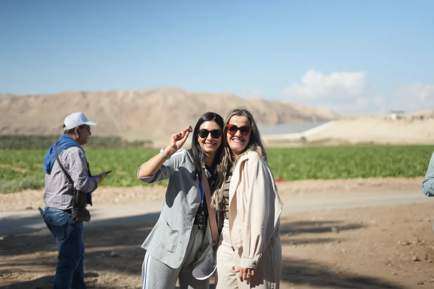 Two Lucent University students smiling in the Jordan Valley during the Biblical Course in Israel
